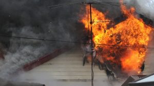 Kings Park fire traps family in home, man arrested