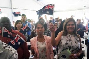 Administrator honoured as new citizens welcomed