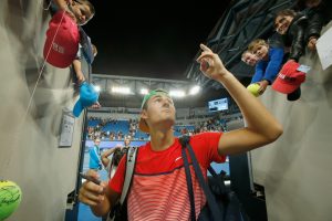 Tomic sets up all-Australian third round battle