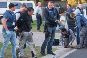 Crime syndicate hit in raids across west