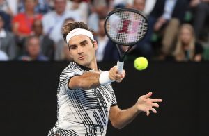 Federer breezes into semi finals