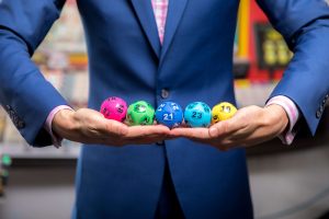 Twenty St Albans Tattslotto players celebrate division one syndicate win