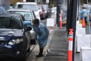 Premier warns of return to restrictions