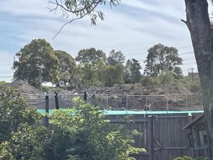 Dirt piles frustrate residents