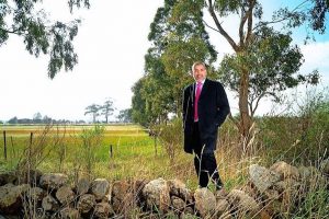 Khan sells up, buys big