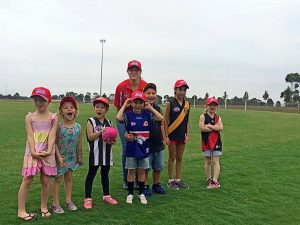 Big sister Holly brings on the kids as Auskick coach